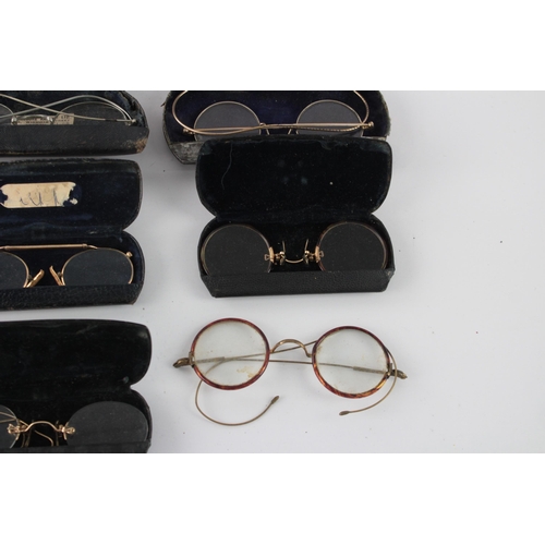 1375 - Thirteen pairs of antique and vintage spectacles