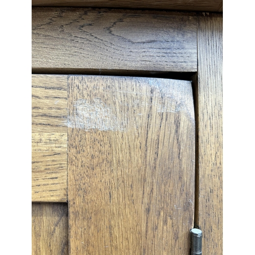 1 - A modern oak double wardrobe - approx. 193cm high x 109cm wide x 58cm deep