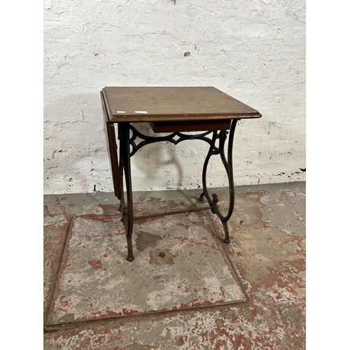 108 - An early 20th century mahogany and wrought iron sewing table - approx. 65cm high x 84cm wide x 44cm ... 