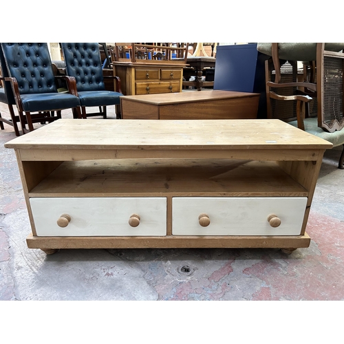 11 - A modern pine and white painted TV stand