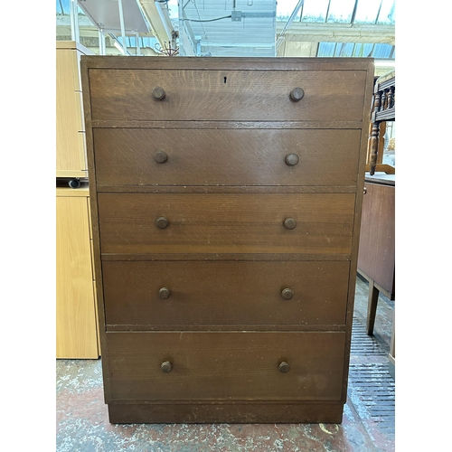 111 - A Heals style oak chest of five drawers - approx. 112cm high x 76cm wide x 46cm deep