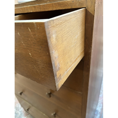 111 - A Heals style oak chest of five drawers - approx. 112cm high x 76cm wide x 46cm deep