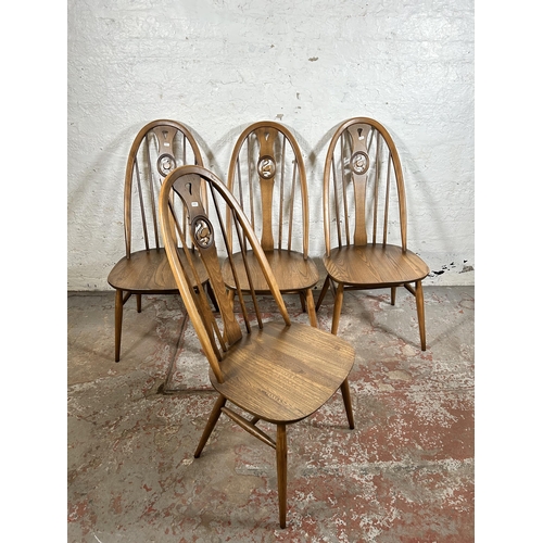 13 - Four Ercol model 876 elm and beech swan back dining chairs