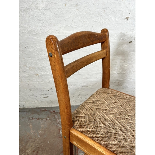 18 - A pair of mid 20th century beech and fabric upholstered kitchen barstools