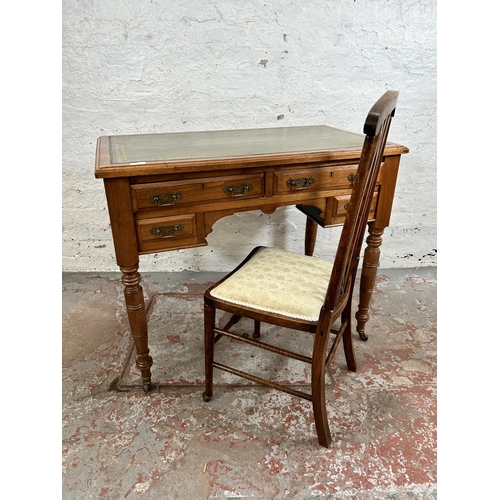 20 - A late 19th century Aesthetic Movement walnut writing desk with two long drawers, two short drawers,... 