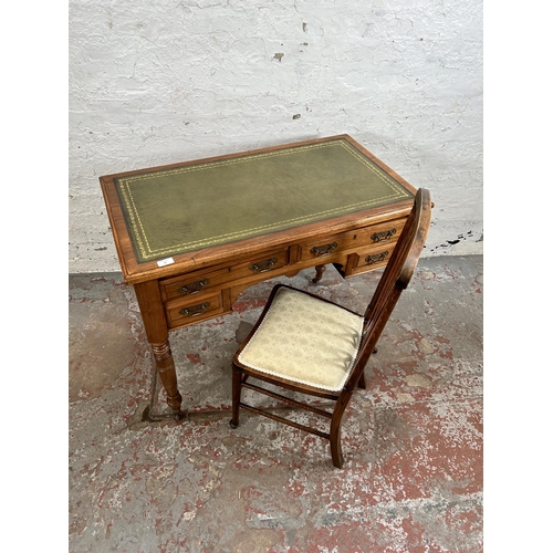 20 - A late 19th century Aesthetic Movement walnut writing desk with two long drawers, two short drawers,... 