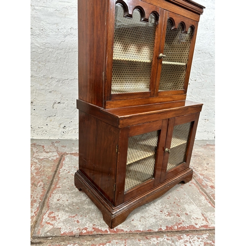 31 - An early 20th century mahogany miniature apprentice display cabinet with four glazed doors - approx.... 