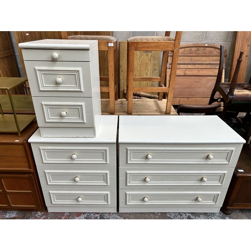 34 - Three white laminate chests of drawers - largest approx. 76cm high x 89cm wide x 45cm deep