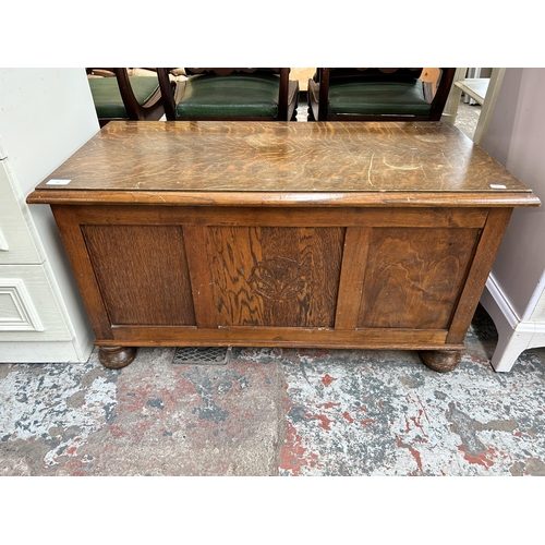 37 - A mid 20th century oak blanket box - approx. 48cm high x 91cm wide x 44cm deep