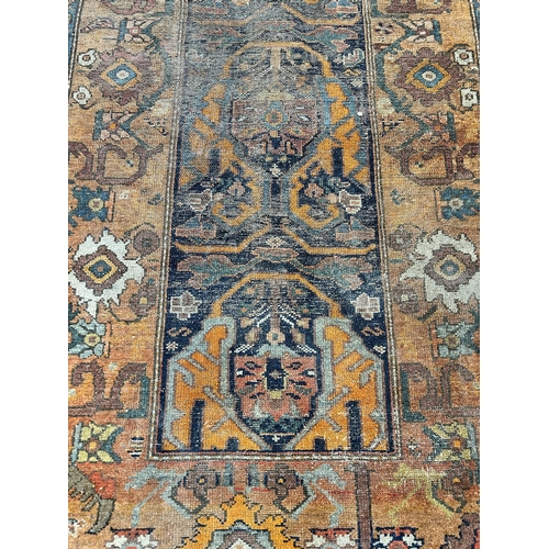 69 - A vintage hand knotted hall runner - approx. 385cm long x 98cm wide