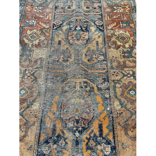 69 - A vintage hand knotted hall runner - approx. 385cm long x 98cm wide