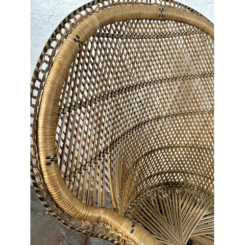 74 - A wicker peacock chair - approx. 112cm high x 84cm wide x 48cm deep