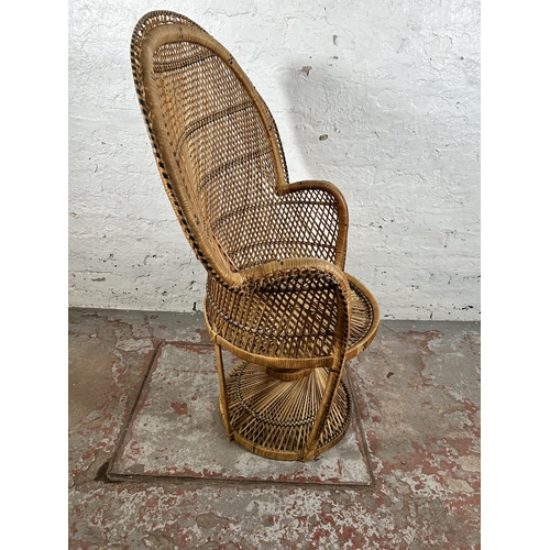 74 - A wicker peacock chair - approx. 112cm high x 84cm wide x 48cm deep