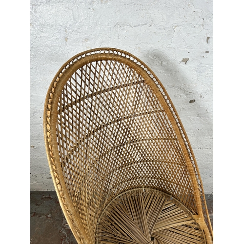 75 - A wicker high back tub chair - approx. 110cm high x 56cm wide x 48cm deep