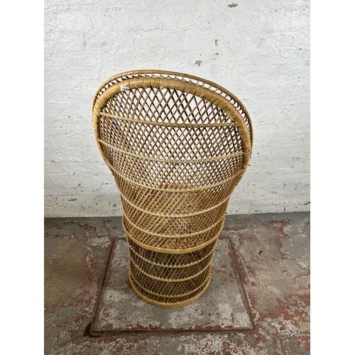 75 - A wicker high back tub chair - approx. 110cm high x 56cm wide x 48cm deep