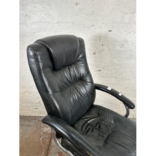 83 - A modern black leatherette swivel office desk chair