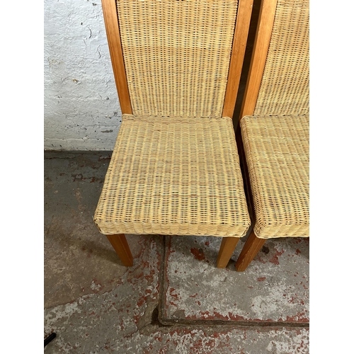 86 - A set of four MGM pine and wicker dining chairs