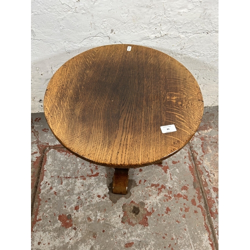 89 - A Titchmarsh & Goodwin solid oak circular side table - approx. 45cm high x 46cm diameter