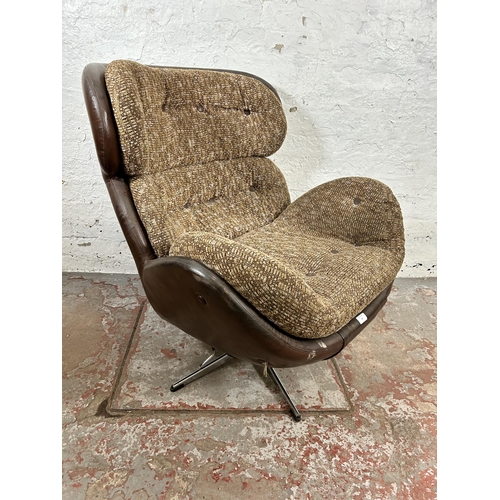 93 - A 1970s Norwegian Ring Möbelfabrik brown leather and fabric swivel armchair - approx. 93cm high x 87... 