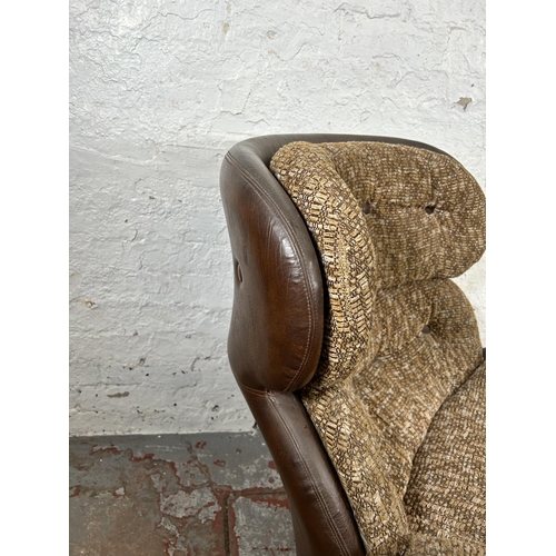 93 - A 1970s Norwegian Ring Möbelfabrik brown leather and fabric swivel armchair - approx. 93cm high x 87... 