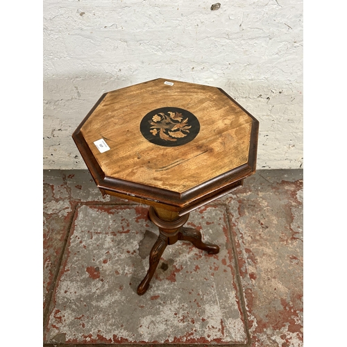 117 - A Victorian inlaid walnut octagonal sewing table with tripod pedestal support - approx. 70cm high x ... 