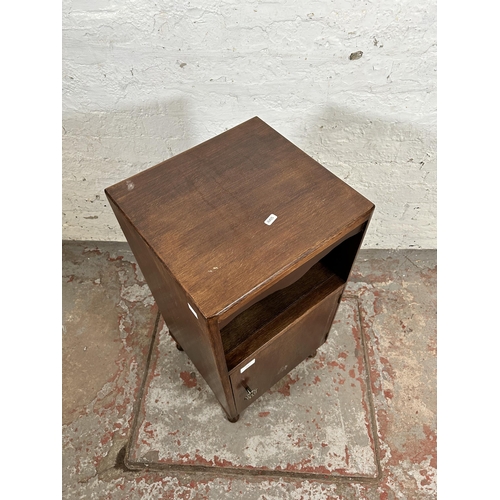 122 - A mid 20th century oak bedside cabinet with cabriole supports - approx. 76cm high x 37cm wide x 35cm... 