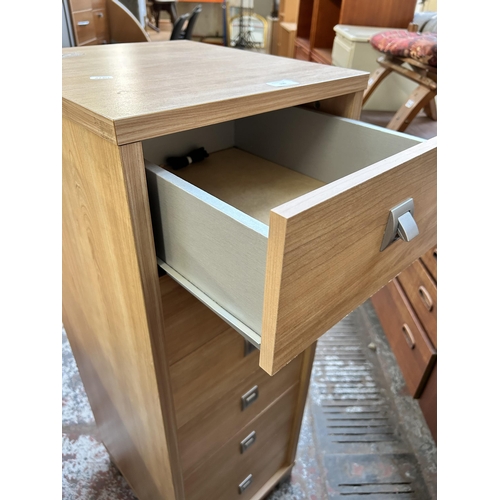 130 - A modern oak effect chest of six drawers - approx. 113cm high x 39cm wide x 44cm deep