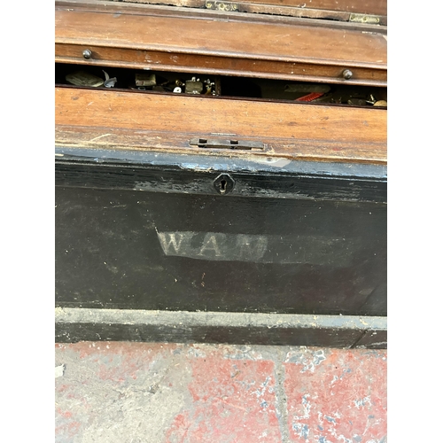 144 - A late 19th century ebonized carpenter's tool chest with fitted interior - approx. 60cm high x 94cm ... 