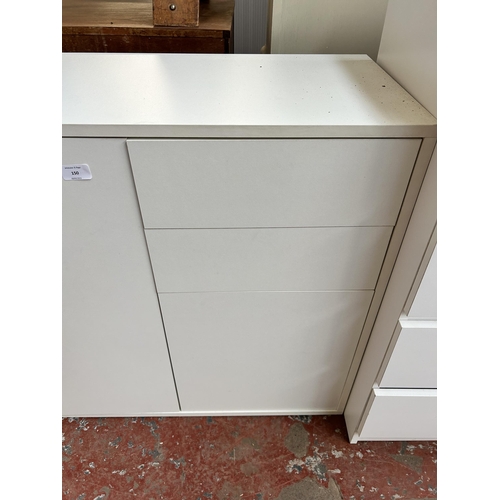 150 - A modern white laminate sideboard with two drawers and two cupboard doors