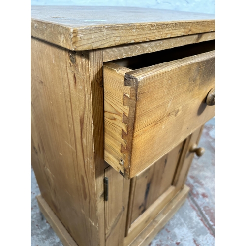 153 - A modern solid pine bedside cabinet - approx. 71cm high x 50cm wide x 38cm deep