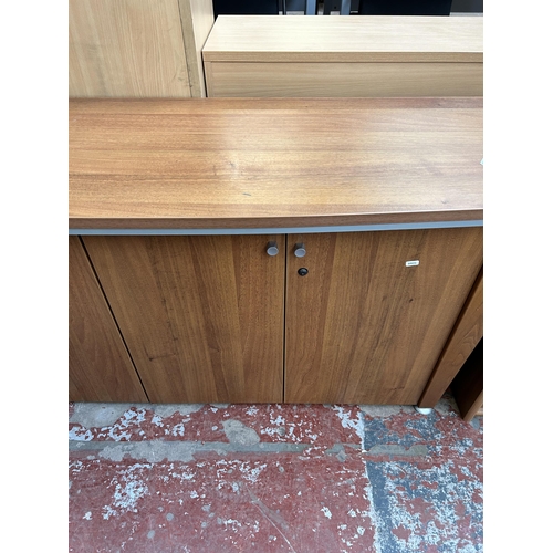 155 - A modern walnut effect office sideboard with four cupboard doors - approx. 77cm high x 186cm wide x ... 