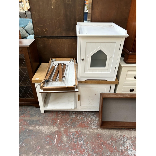 173 - Ten pieces of furniture to include beech and white painted TV stand, mid 20th century teak wall moun... 