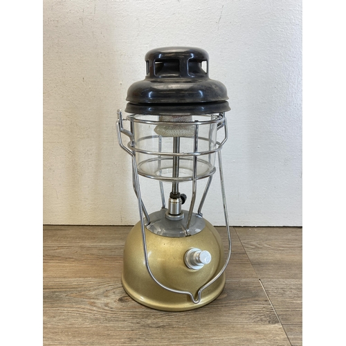 430 - A vintage boxed Tilley X246B Storm Light paraffin lantern with instruction manuals and accessories