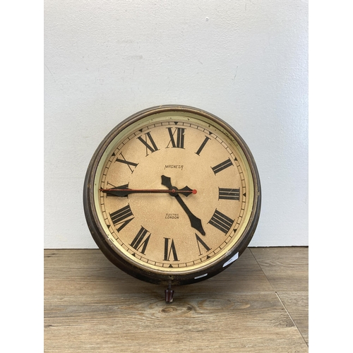 434 - An early/mid 20th century Magneta electric wall clock - approx. 38cm diameter