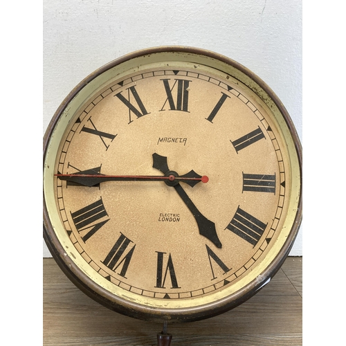 434 - An early/mid 20th century Magneta electric wall clock - approx. 38cm diameter