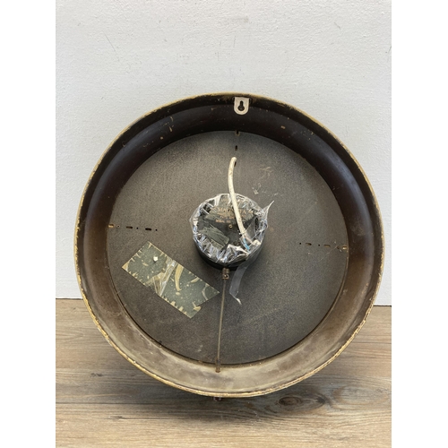 434 - An early/mid 20th century Magneta electric wall clock - approx. 38cm diameter