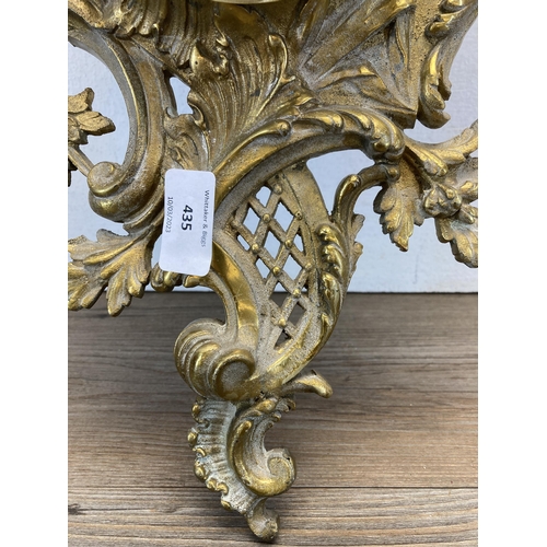 435 - A Rococo style gilded cast metal wall mountable barometer - approx. 50cm long