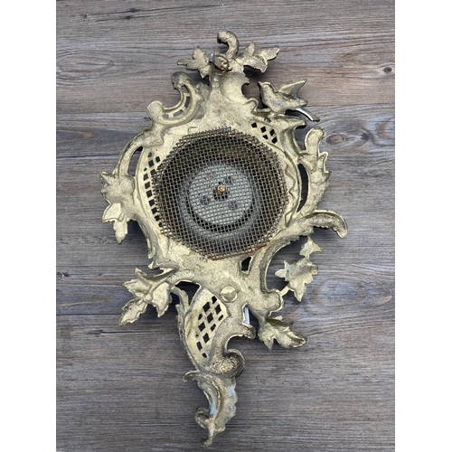 435 - A Rococo style gilded cast metal wall mountable barometer - approx. 50cm long