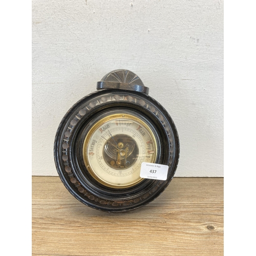 437 - An early/mid 20th century carved wall mountable barometer - approx. 22cm diameter