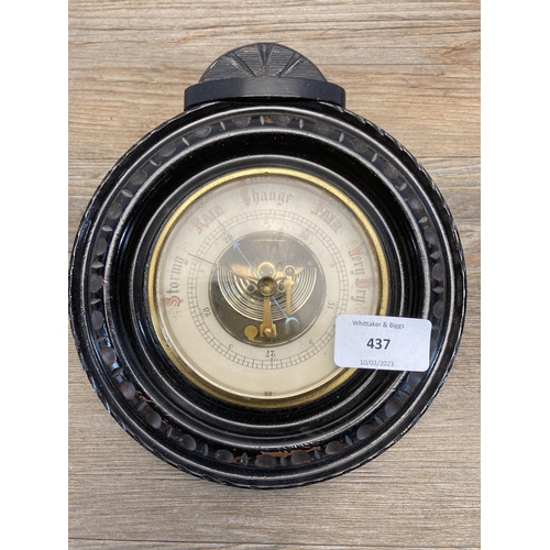 437 - An early/mid 20th century carved wall mountable barometer - approx. 22cm diameter