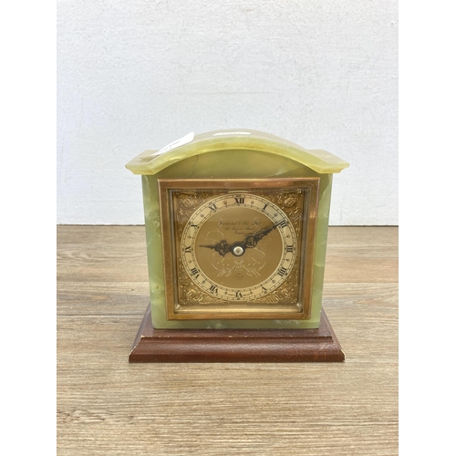 439 - An Elliott onyx, brass and mahogany mantel clock retailed by Garrard & Co Ltd - approx. 16cm high x ... 