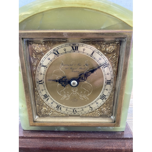 439 - An Elliott onyx, brass and mahogany mantel clock retailed by Garrard & Co Ltd - approx. 16cm high x ... 