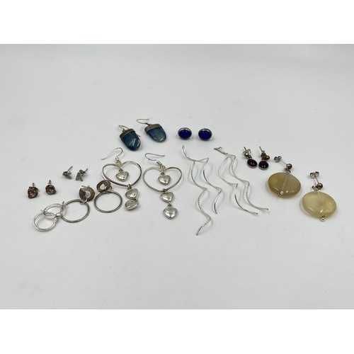 1239 - A collection of .925 silver earrings to include lapis lazuli etc.