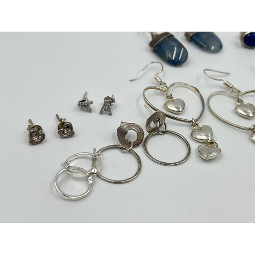 1239 - A collection of .925 silver earrings to include lapis lazuli etc.