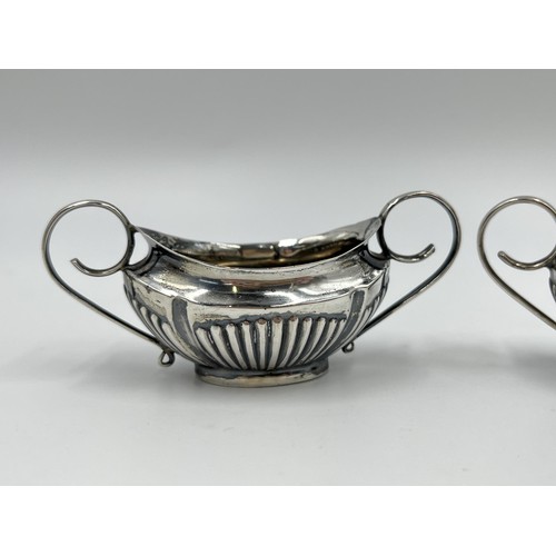 1270 - A pair of Edwardian Walker & Hall hallmarked Sheffield silver twin handled salt cellars, dated 1902 ... 