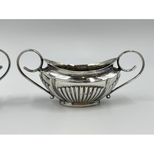 1270 - A pair of Edwardian Walker & Hall hallmarked Sheffield silver twin handled salt cellars, dated 1902 ... 