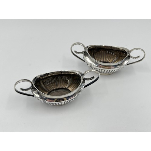 1270 - A pair of Edwardian Walker & Hall hallmarked Sheffield silver twin handled salt cellars, dated 1902 ... 