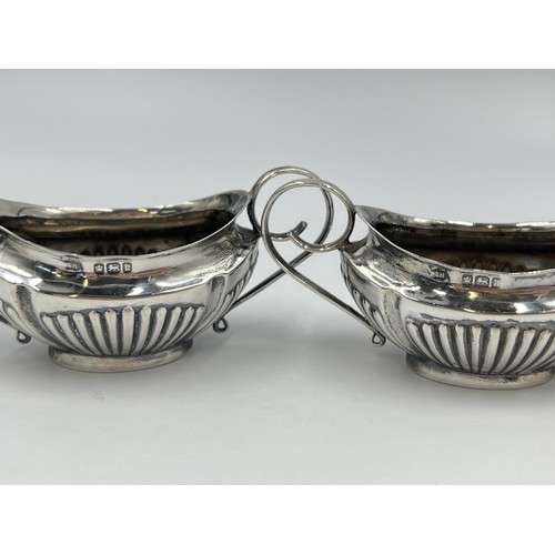 1270 - A pair of Edwardian Walker & Hall hallmarked Sheffield silver twin handled salt cellars, dated 1902 ... 