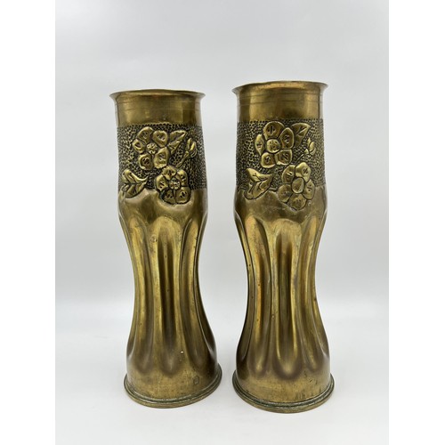 1357 - A pair of WWI Trench Art brass shell case vases, dated 1918 - approx. 29cm high