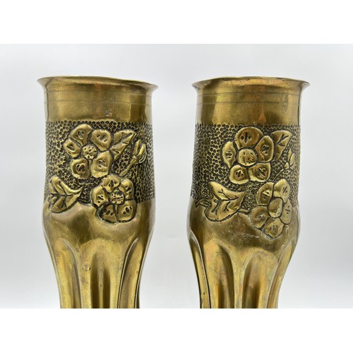 1357 - A pair of WWI Trench Art brass shell case vases, dated 1918 - approx. 29cm high